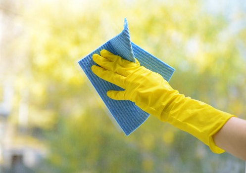 Professional office cleaners working in a modern Shoreditch workspace