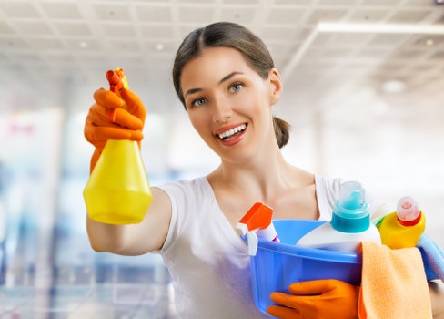 Professional oven cleaning service in Shoreditch removing grease from a kitchen oven
