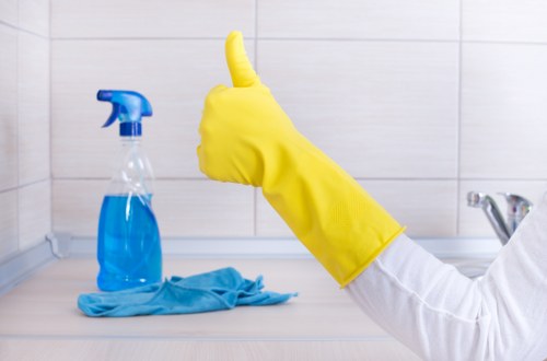 Illustration of an ethical cleaning team supporting a zero-tolerance anti-slavery policy