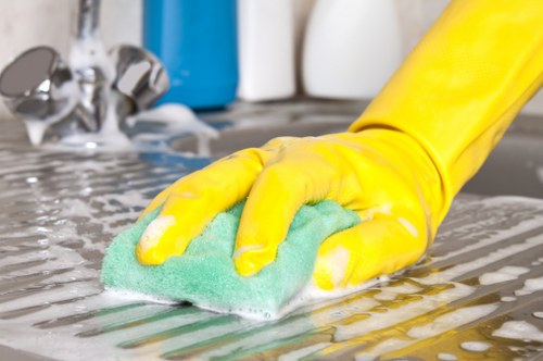 Deep cleaning a modern sofa to remove stains and dust