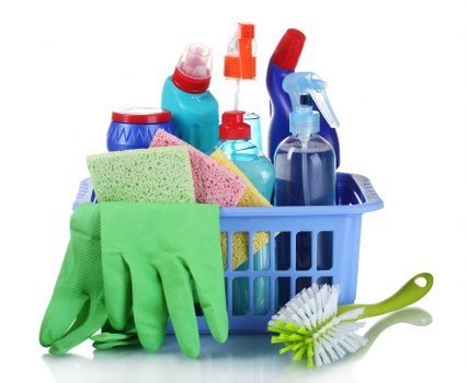 Safe use of cleaning chemicals and protective gloves during oven cleaning